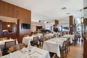 Breakfast, lunch, dinner served; international cuisine, beach views