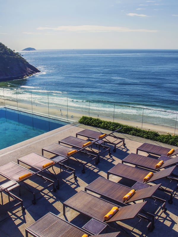 Outdoor pool, open 8 AM to 8 PM, pool umbrellas, sun loungers