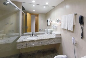 Shower, hair dryer, towels, shampoo