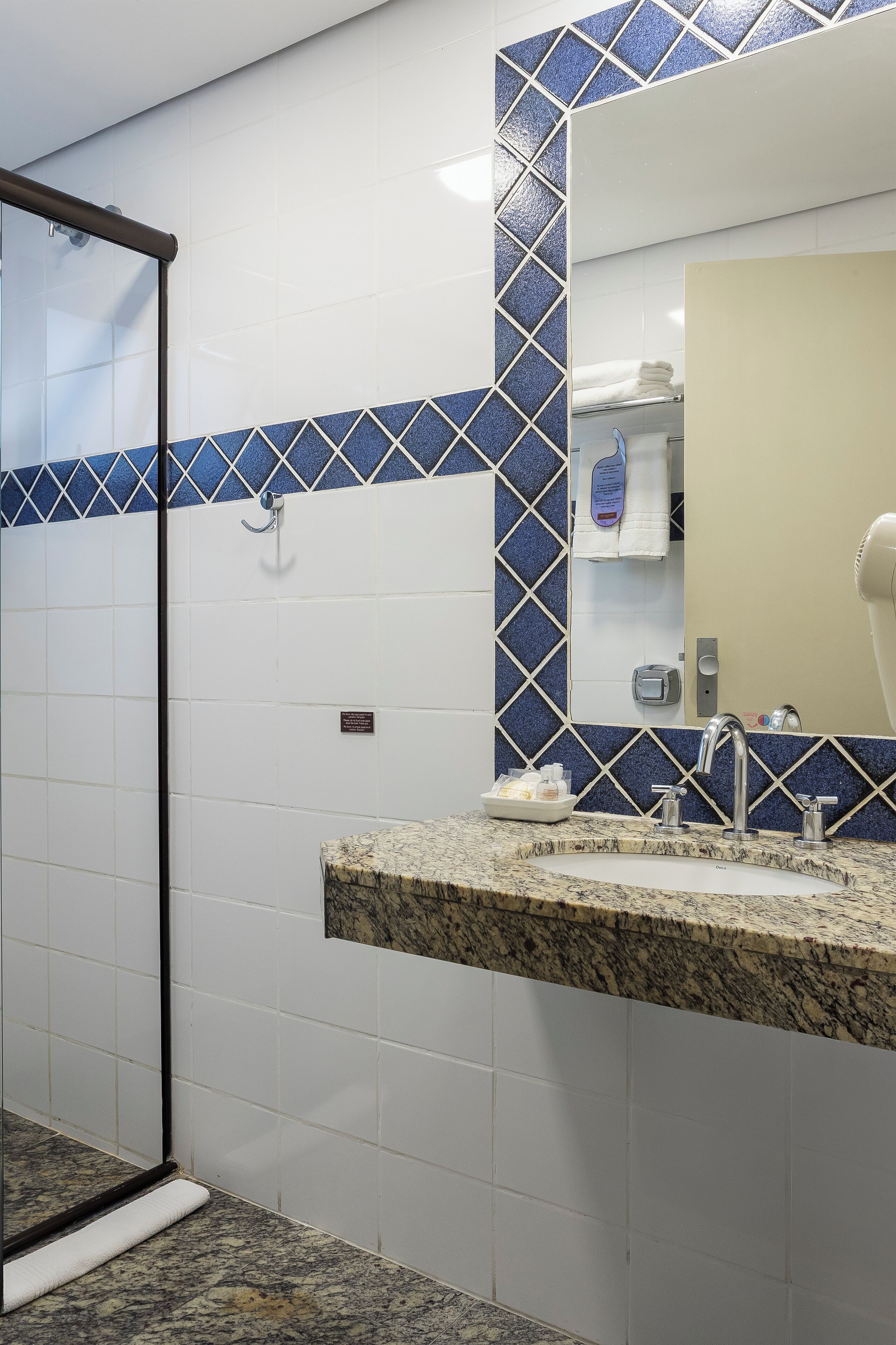 shower, free toiletries, hair dryer, towels