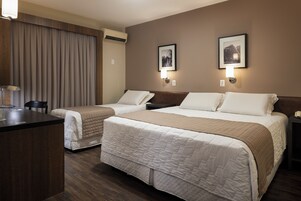 Executive Triple Room | Minibar, in-room safe, desk, laptop workspace