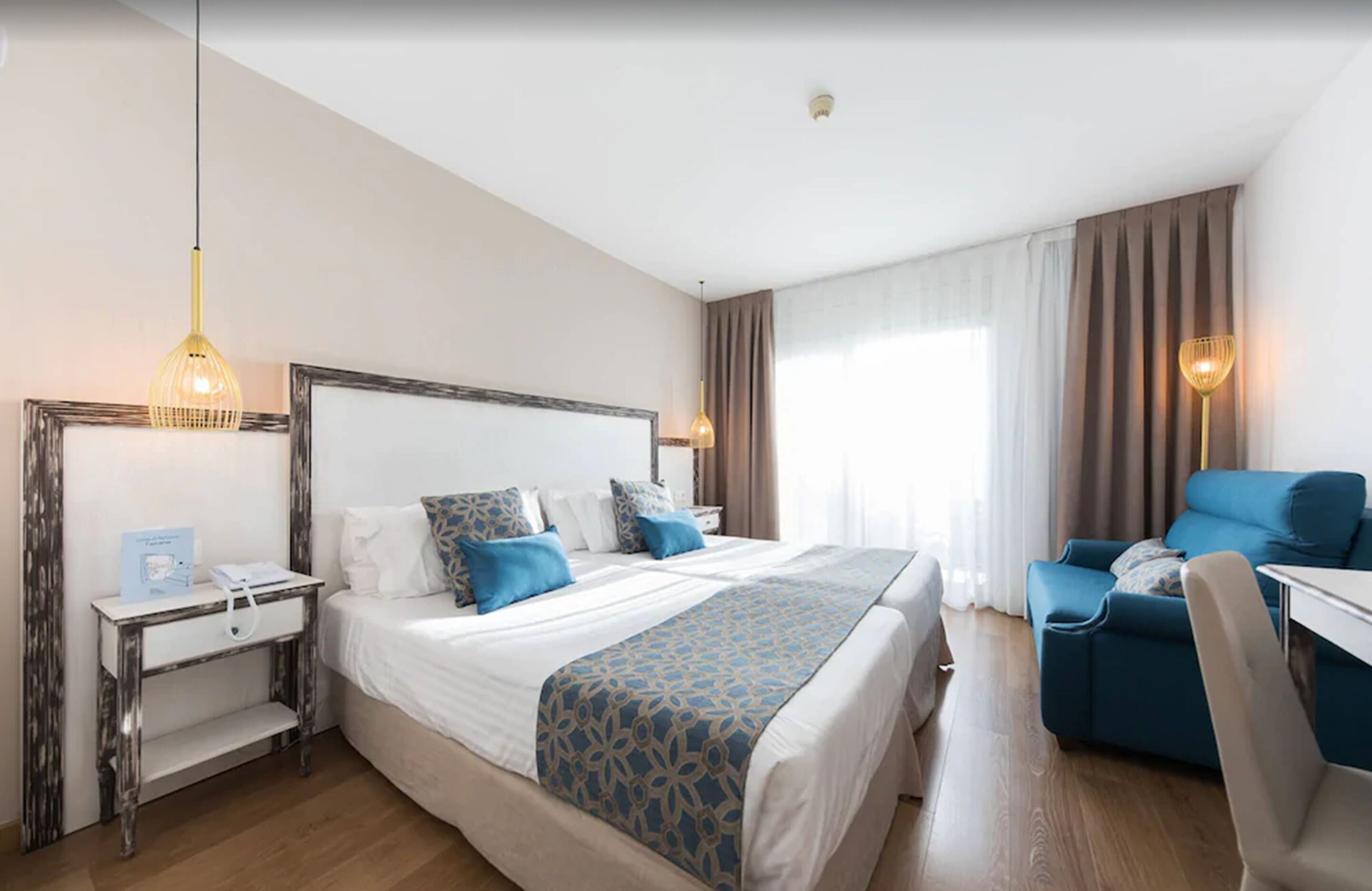 superior double room, balcony, ocean view | minibar, in-room safe, desk, blackout curtains