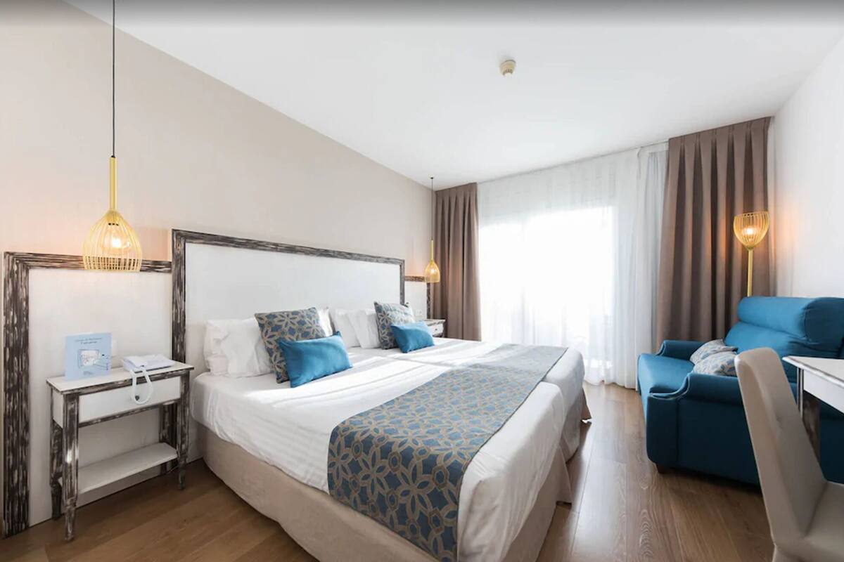 superior double room, balcony, ocean view | minibar, in-room safe, desk, blackout curtains