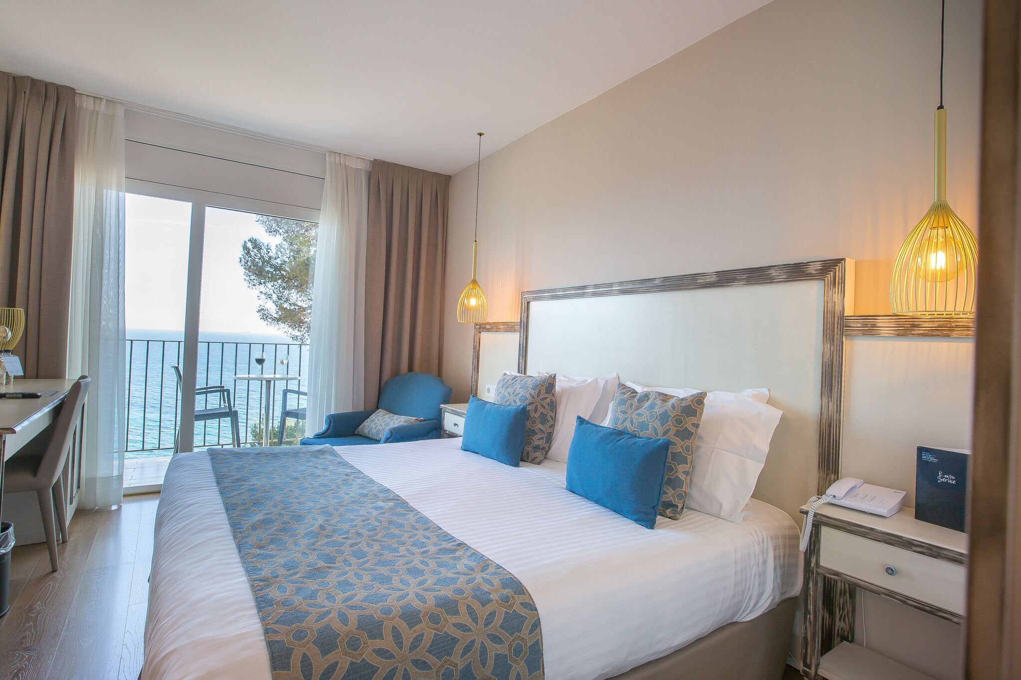 superior double room, balcony, ocean view | minibar, in-room safe, desk, blackout curtains