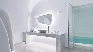 Designer toiletries, hair dryer, bathrobes, slippers