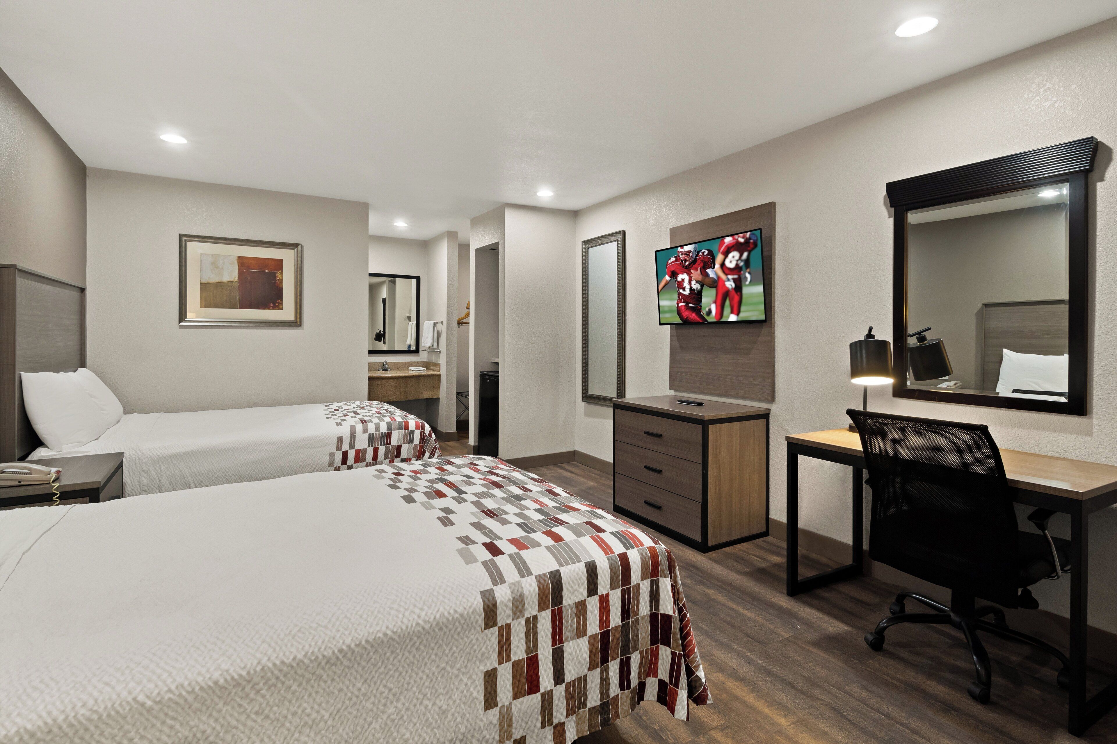 Desk, laptop workspace, blackout drapes, rollaway beds (surcharge)