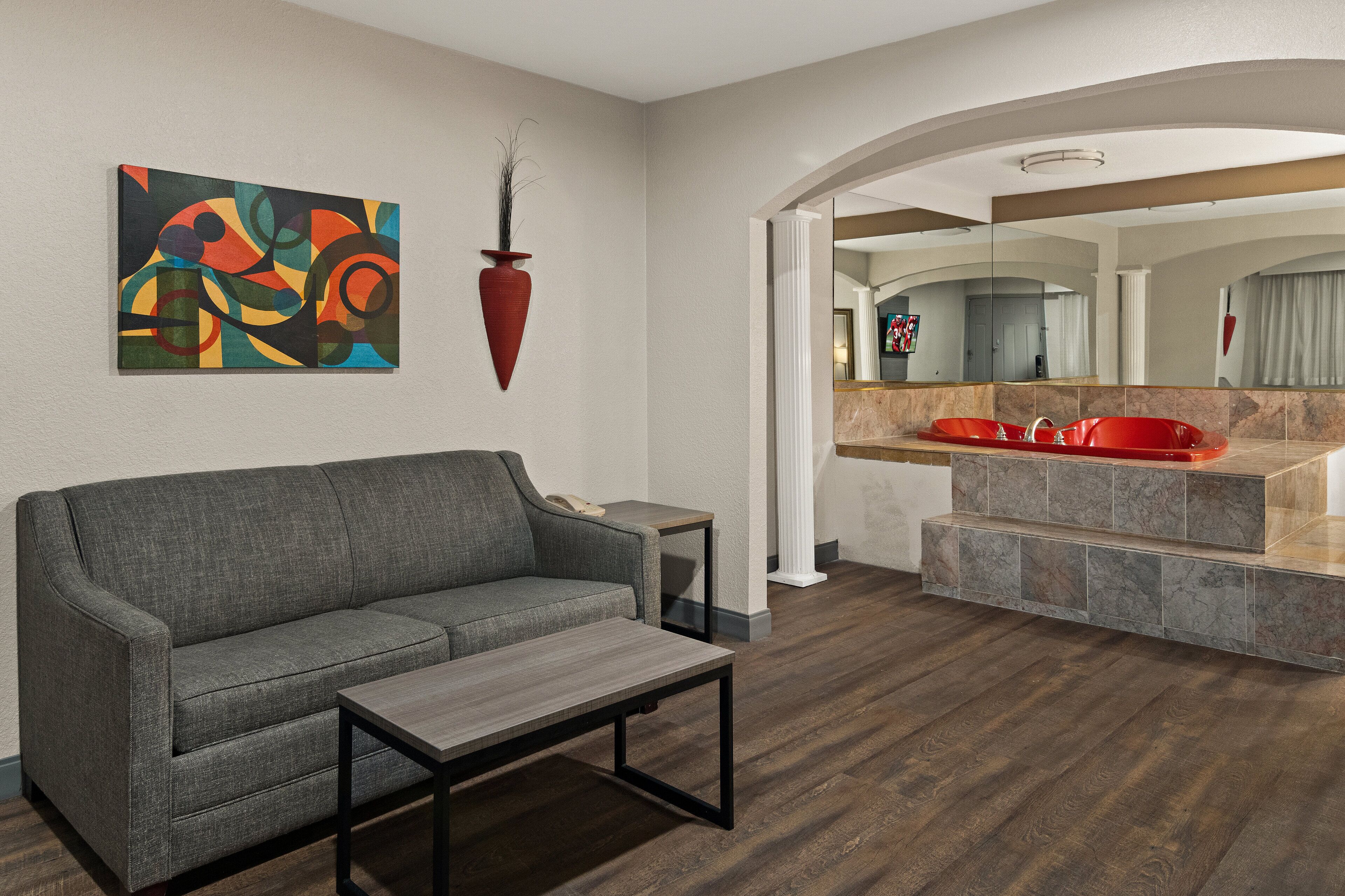 Suite, 1 King Bed with Sofa bed, Non Smoking, Jetted Tub | Desk, laptop workspace, blackout drapes, rollaway beds