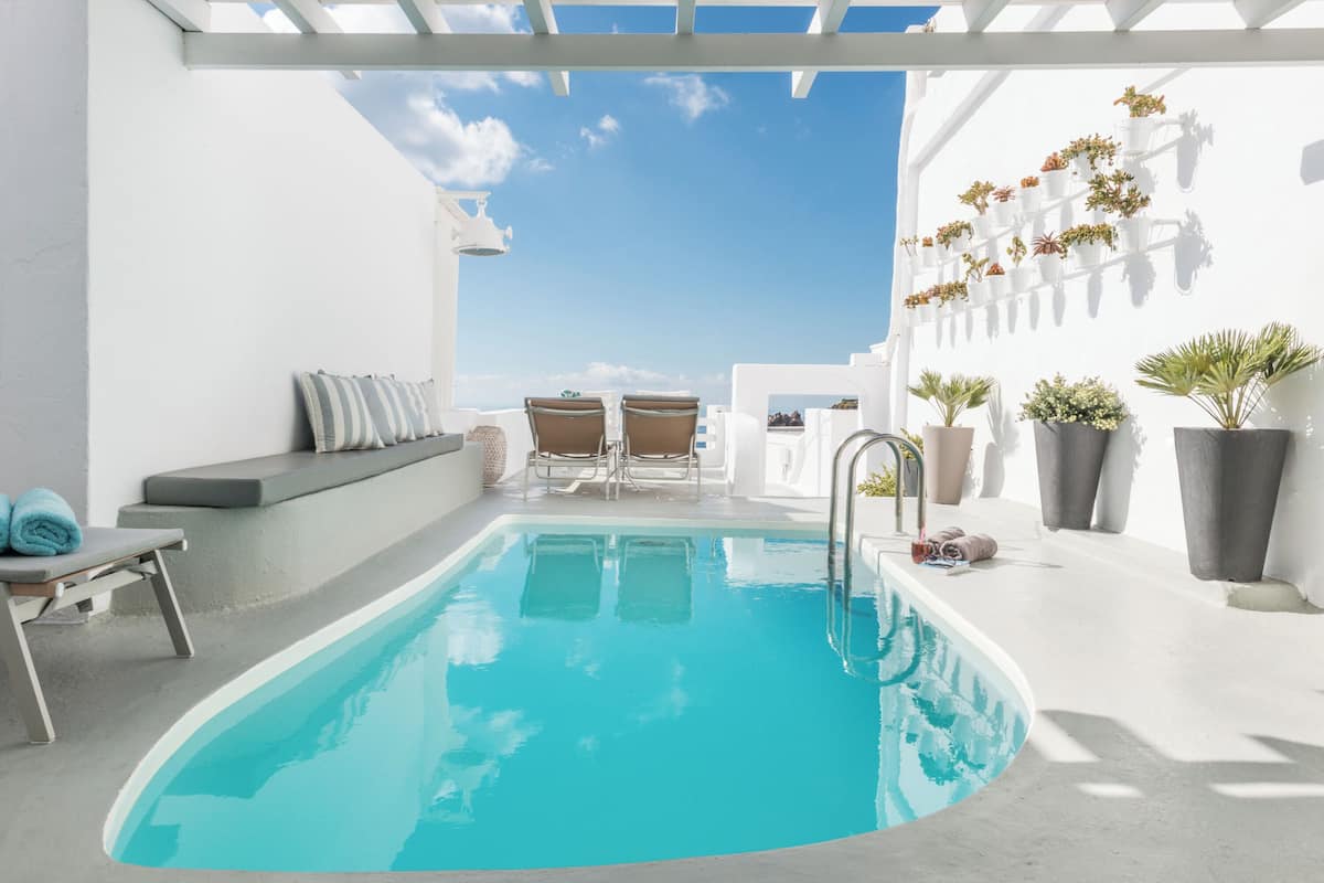 Suite, Private Pool (Master-Caldera View) | Minibar, in-room safe, blackout drapes, soundproofing