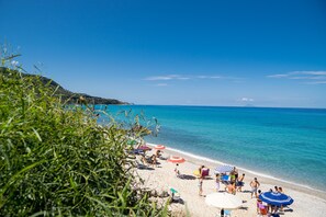 Free beach shuttle, sun-loungers, beach umbrellas