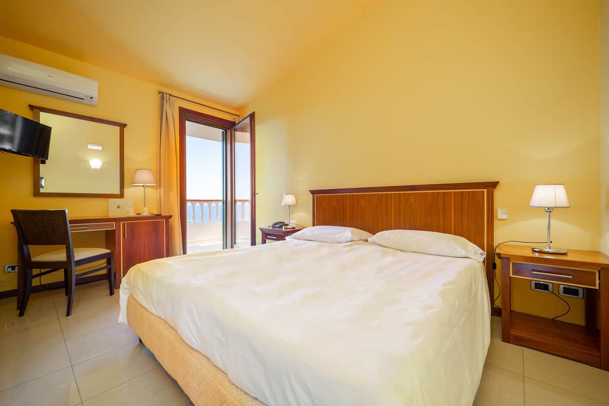Classic Double Room, Sea View | Premium bedding, minibar, in-room safe, desk