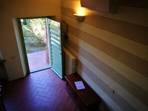 Quadruple Room | Living area | 28-inch TV with digital channels