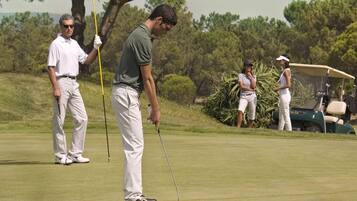 Golfers can tee off on the well-manicured greens.