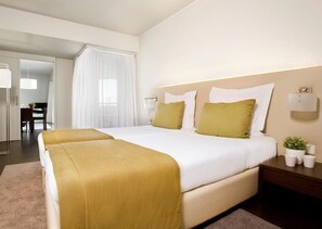 In-room safe, blackout curtains, iron/ironing board, cots/infant beds