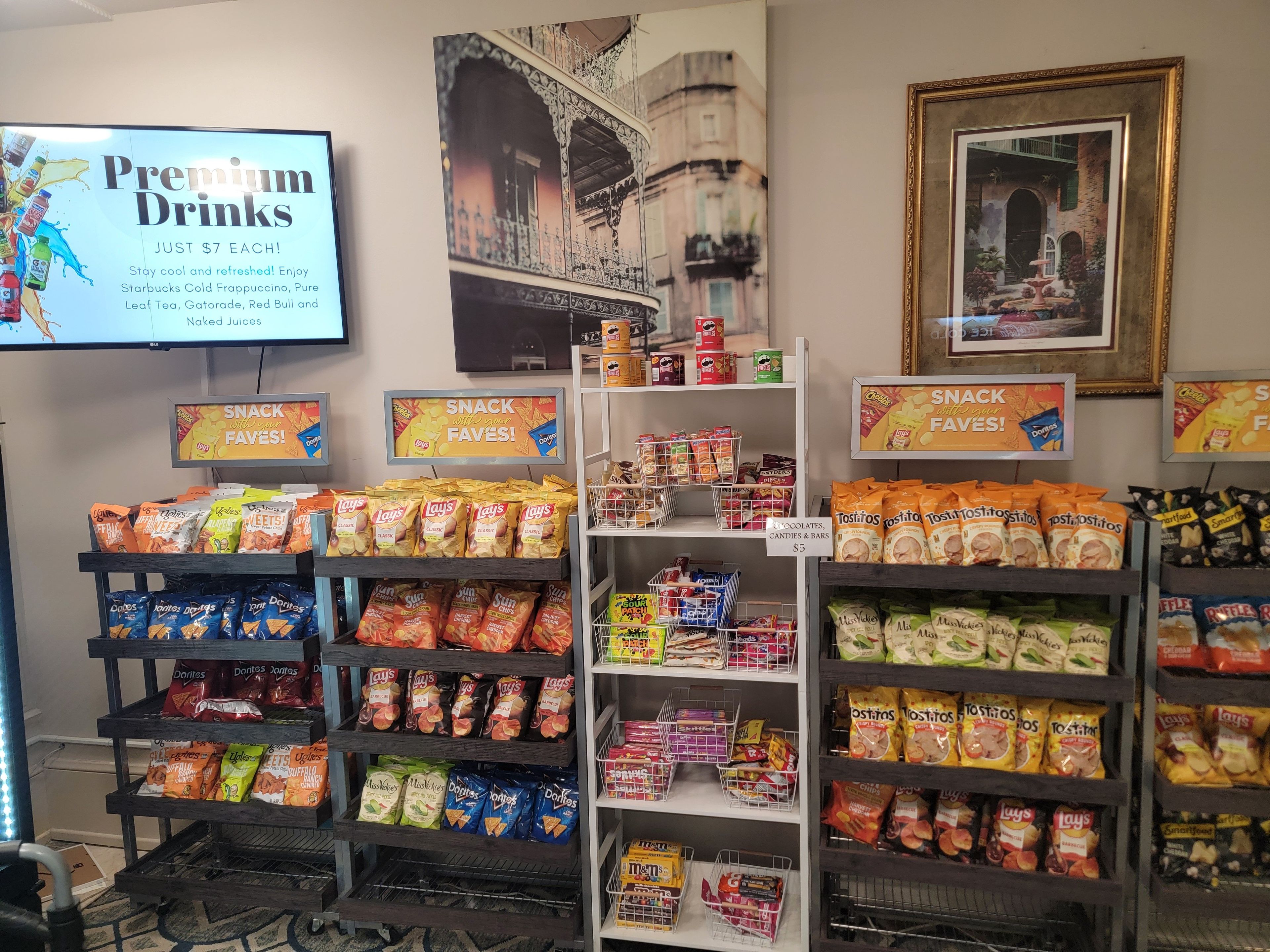 A snack and drink section with various brands like Lay's, Doritos, and Tostitos.