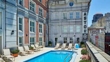 Outdoor pool, open 8:00 AM to 8:00 PM, pool loungers
