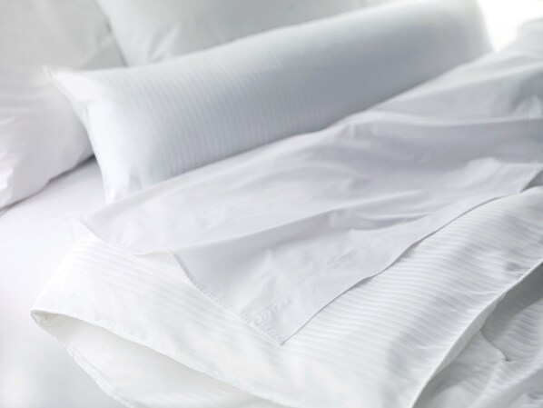 Premium bedding, pillow-top beds, in-room safe, desk