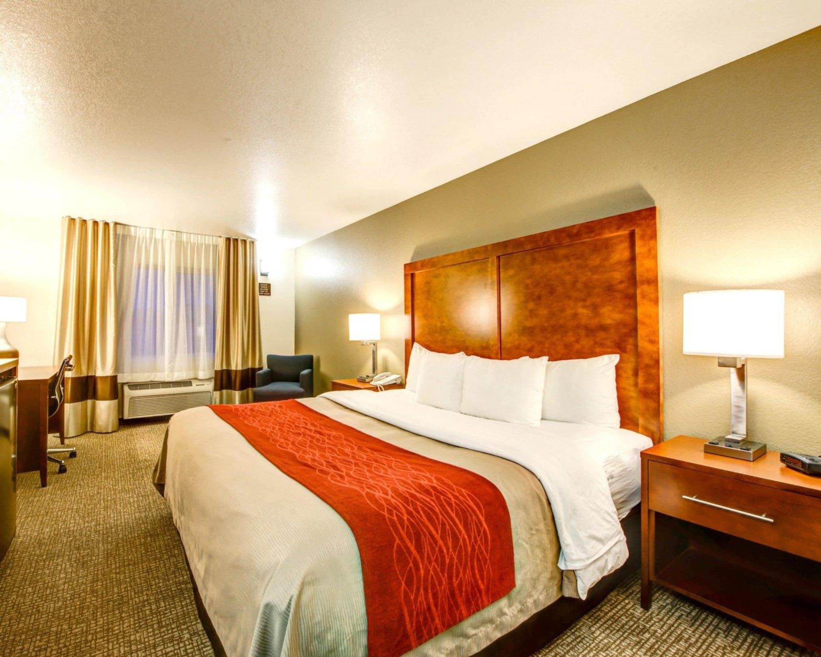 Premium bedding, pillow-top beds, blackout curtains, iron/ironing board