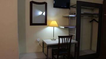 Desk, blackout drapes, bed sheets