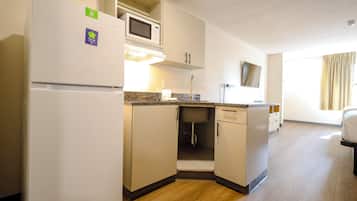Fridge, microwave, stovetop, coffee/tea maker