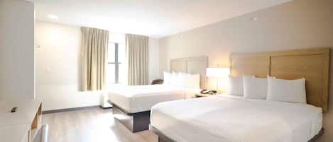 Studio, 2 Double Beds, Non Smoking | Pillow-top beds, desk, laptop workspace, blackout curtains