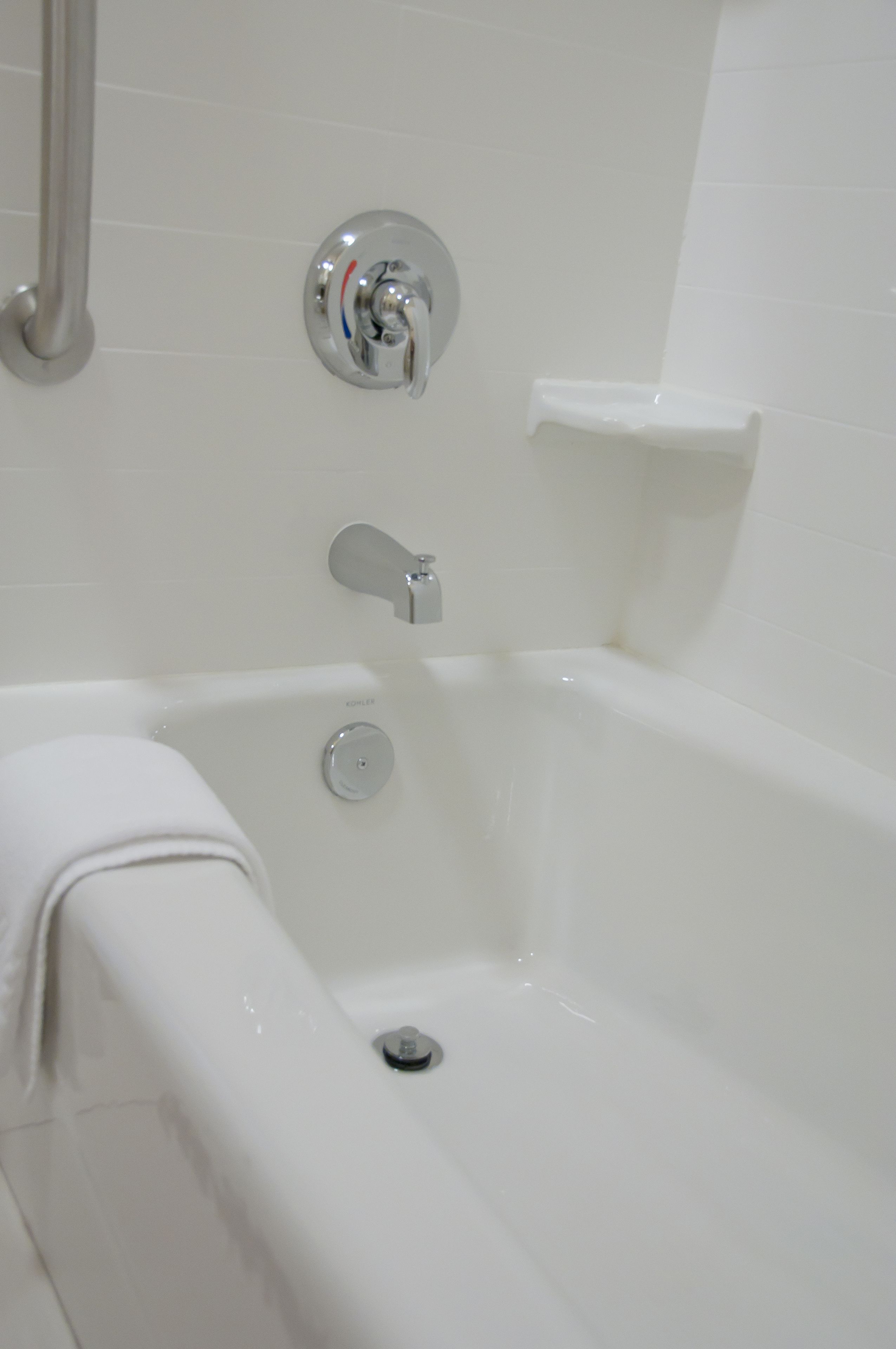 suite, 1 king bed, non smoking | bathroom | combined shower/bathtub, designer toiletries, hair dryer, towels