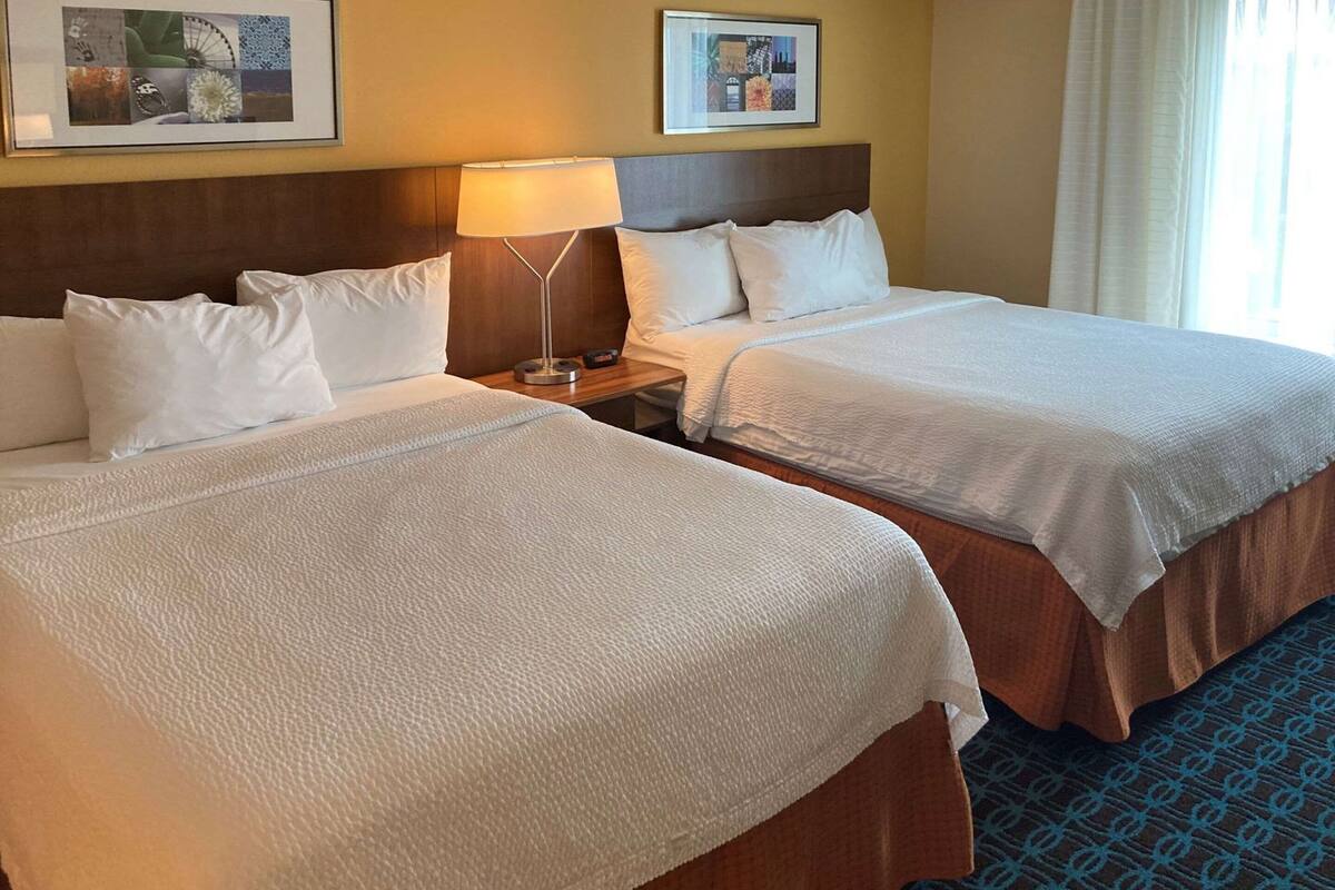 Egyptian cotton sheets, premium bedding, Tempur-Pedic beds, desk