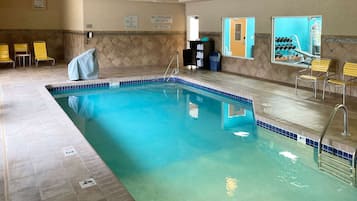 Indoor pool, open 7 AM to 11 PM, pool loungers