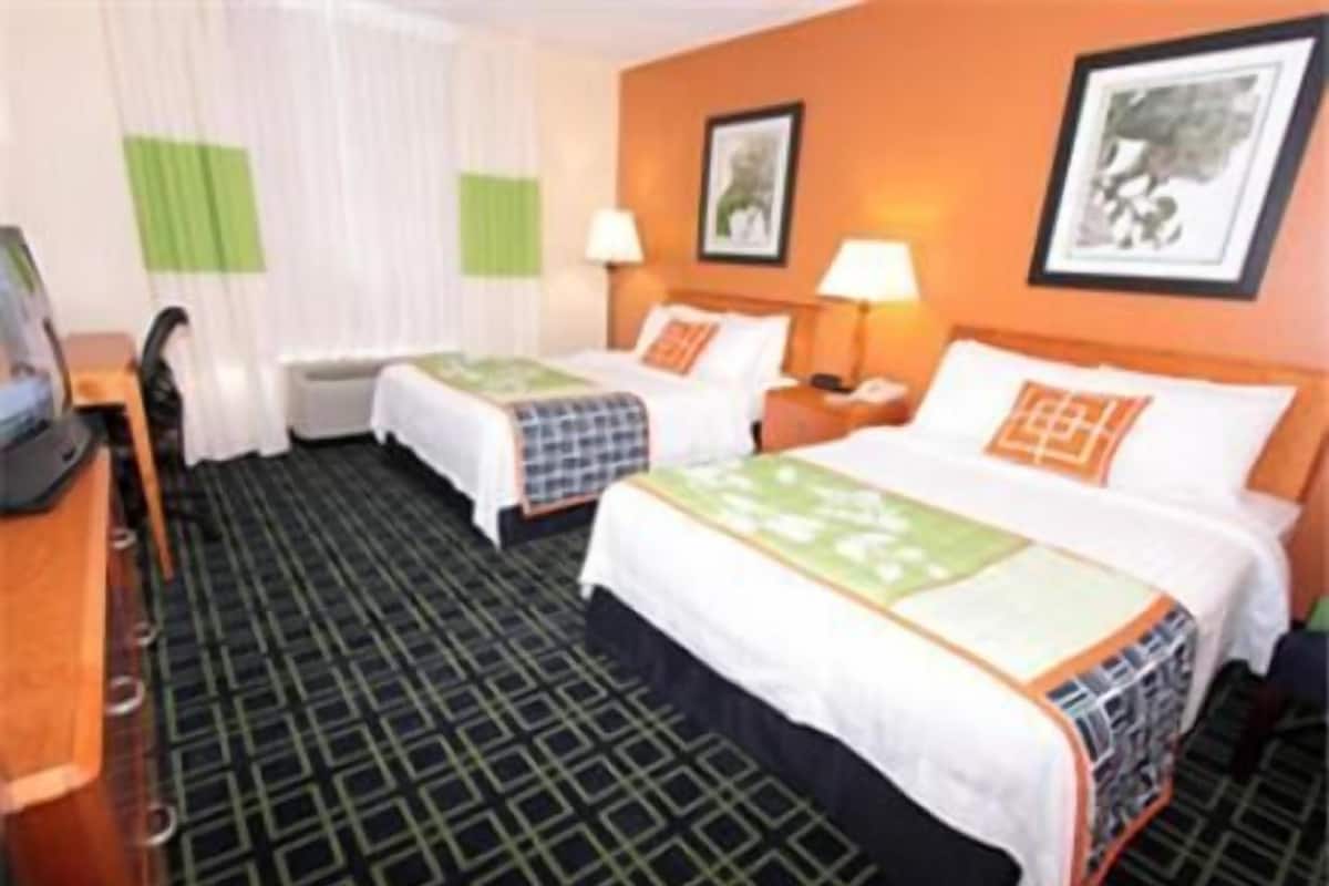 Premium bedding, down comforters, pillowtop beds, desk