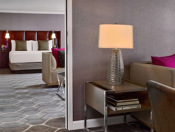 Egyptian cotton sheets, premium bedding, pillowtop beds, in-room safe at The Royal Sonesta Houston Galleria