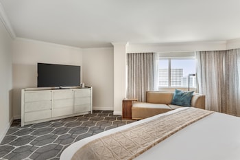 Egyptian cotton sheets, premium bedding, pillowtop beds, in-room safe at The Royal Sonesta Houston Galleria