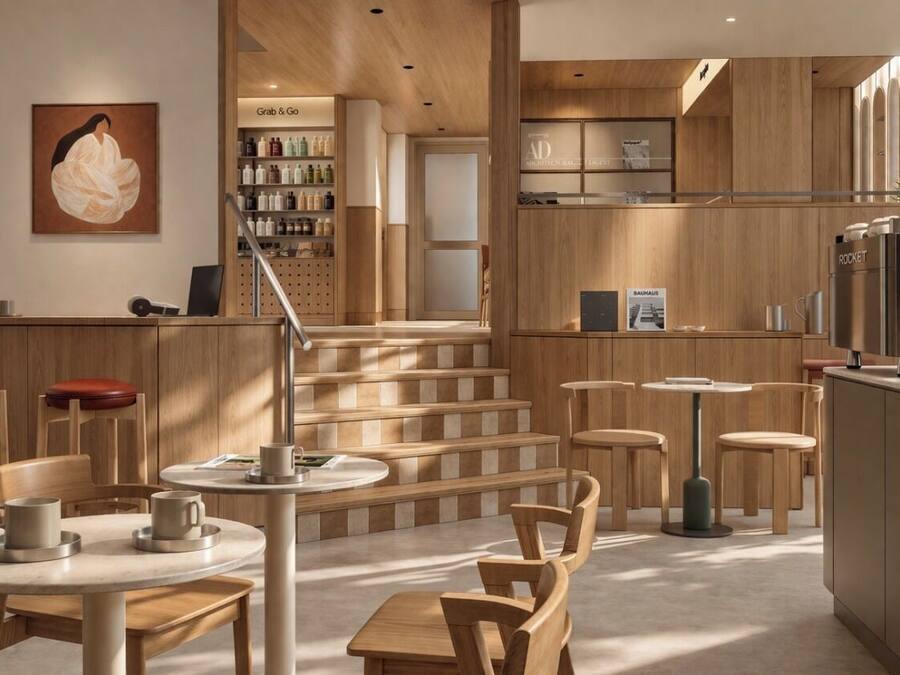 Um interior moderno com mobiliário de madeira, uma área de cozinha e uma escada.