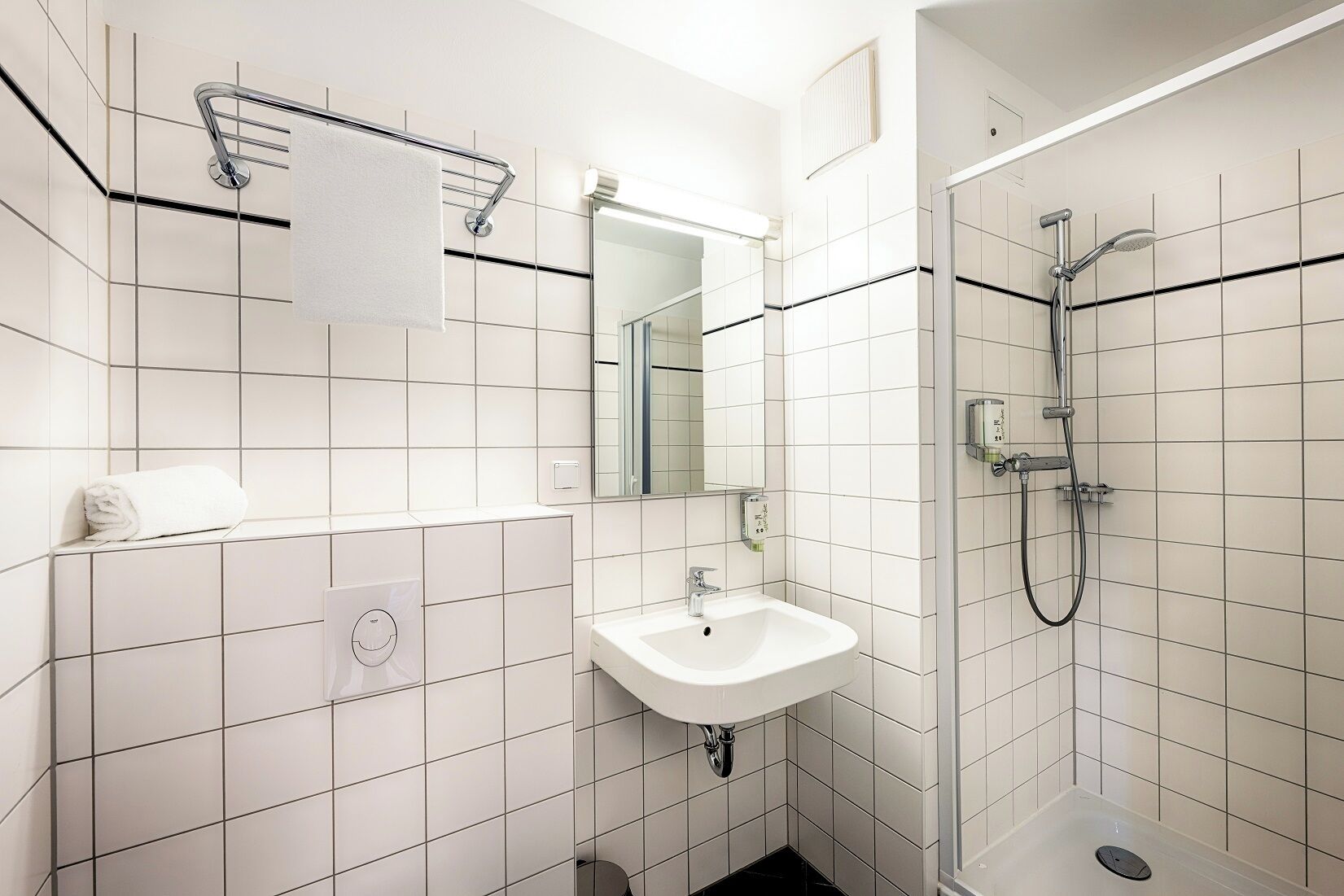single room | bathroom | shower, hair dryer, towels, soap