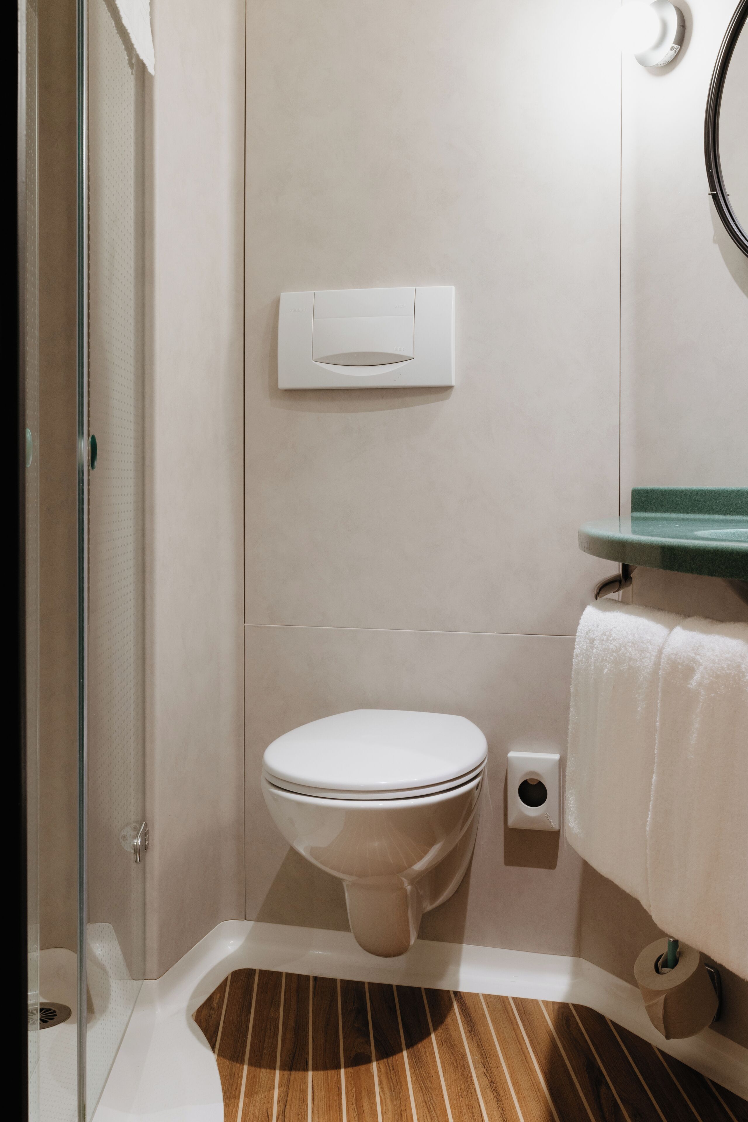 shower, eco-friendly toiletries, hair dryer, towels