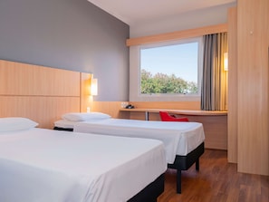 Standard Apartment, 2 Single Beds | Minibar, in-room safe, desk, soundproofing