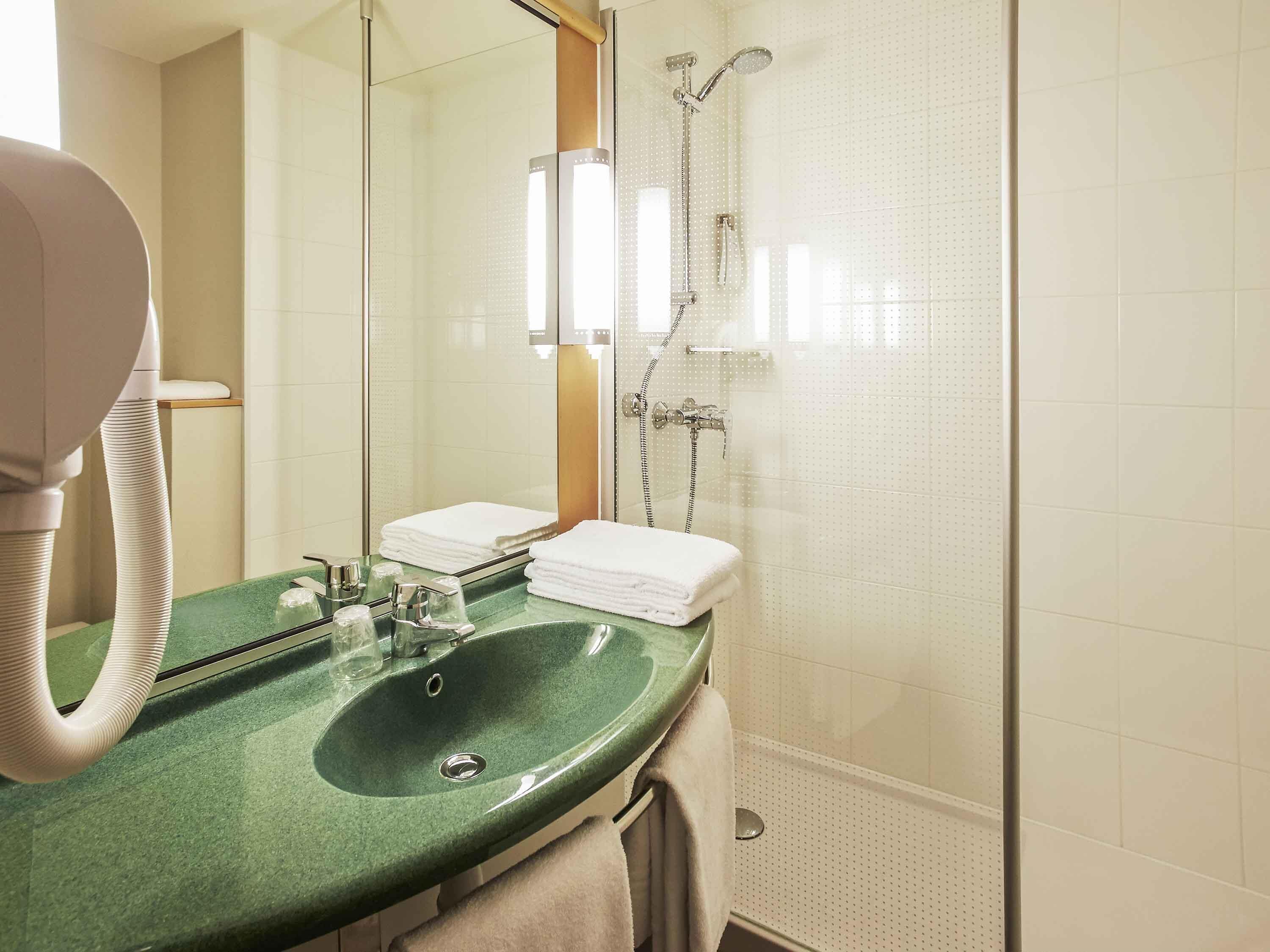 premium bedding, desk, laptop workspace, blackout curtains