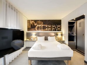 Suite exécutive, 1 grand lit et 1 canapé-lit | Literie de qualité, coffre-fort pour ordinateur portable, bureau
