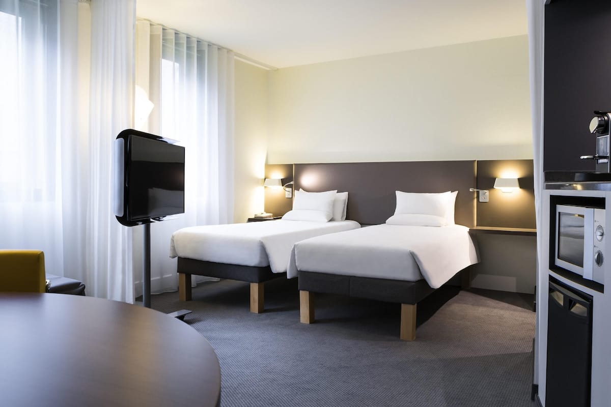 Family Suite, Multiple Beds (Family, 4 personnes) | Premium bedding, in-room safe, desk, laptop workspace