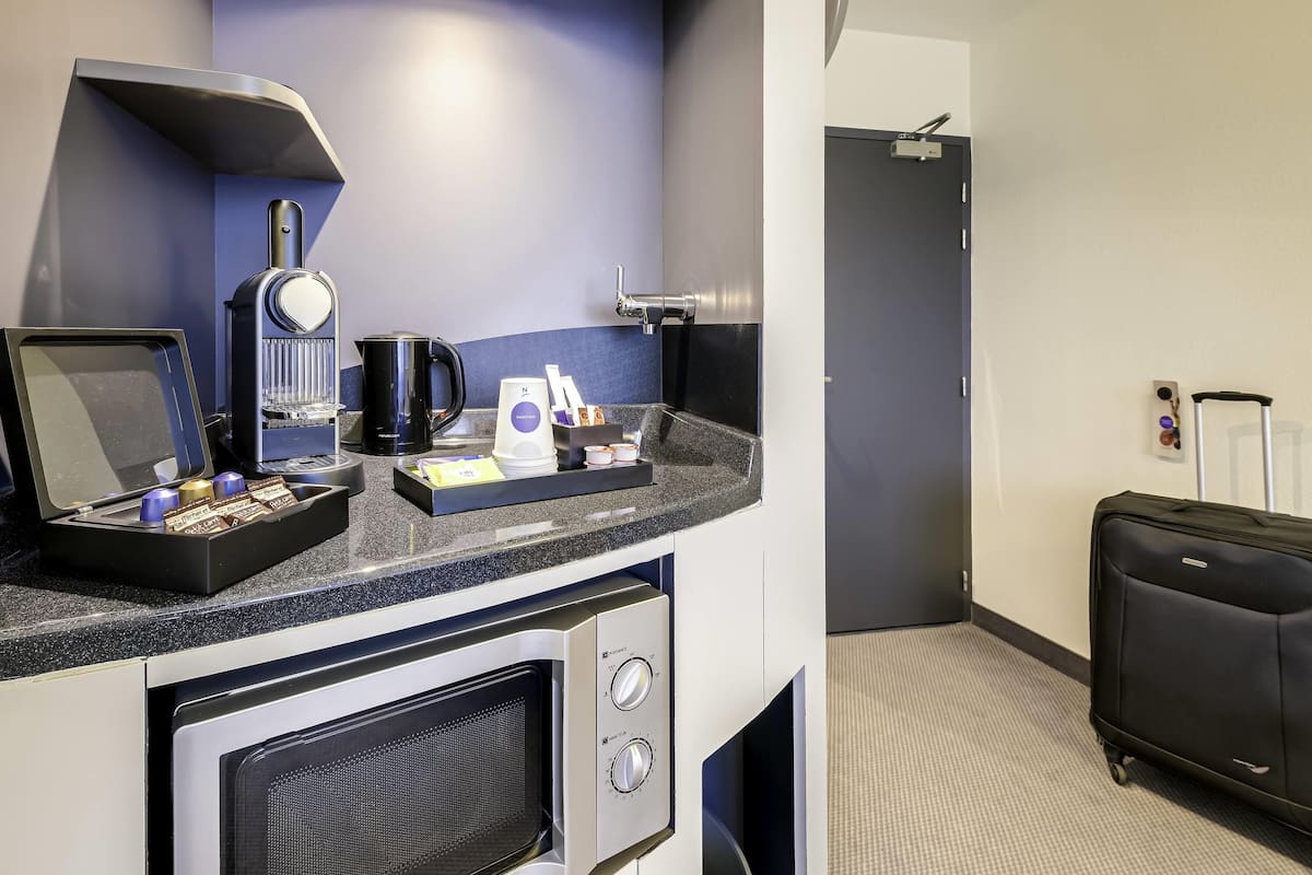 Suíte executiva, 1 cama Queen e sofá-cama | Roupas de cama premium, cofres nos quartos, escrivaninha