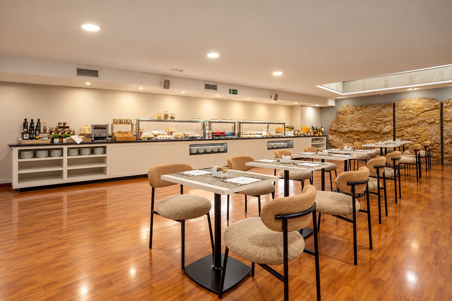 A restaurant with a buffet area, multiple tables, and chairs.
