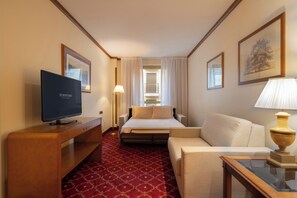 Junior Suite | Living area | Flat-screen TV