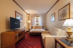 Junior Suite | Living area | Flat-screen TV