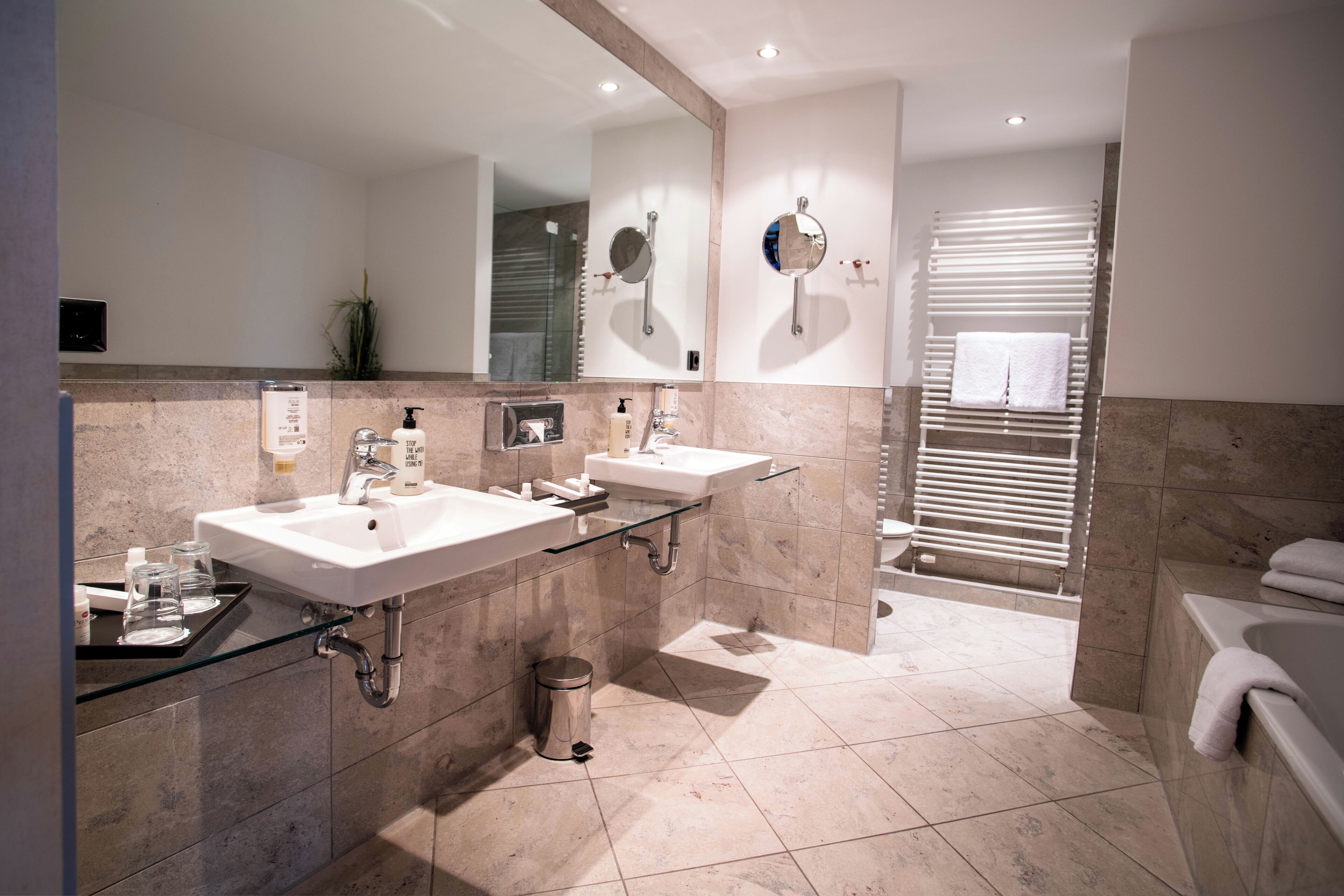 suite, 1 double bed (separate living room) | bathroom | free toiletries, hair dryer, towels, soap