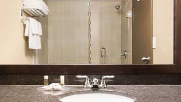 Combined shower/tub, designer toiletries, hair dryer, towels