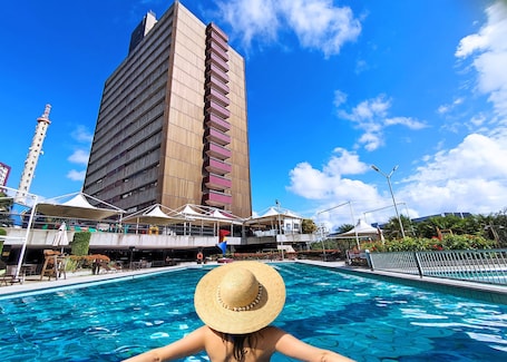 Outdoor pool, open 9:00 AM to 6:00 PM, pool umbrellas, sun loungers. Fiesta Bahia Hotel