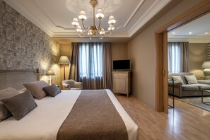 Premium bedding, down comforters, minibar, in-room safe