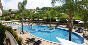 2 outdoor pools, pool umbrellas, pool loungers