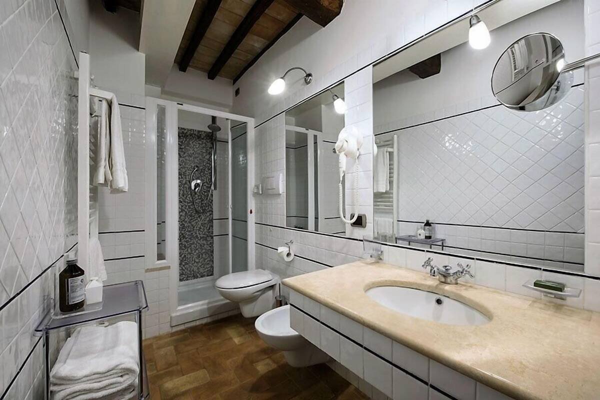 superior double room | bathroom | shower, free toiletries, hair dryer, slippers