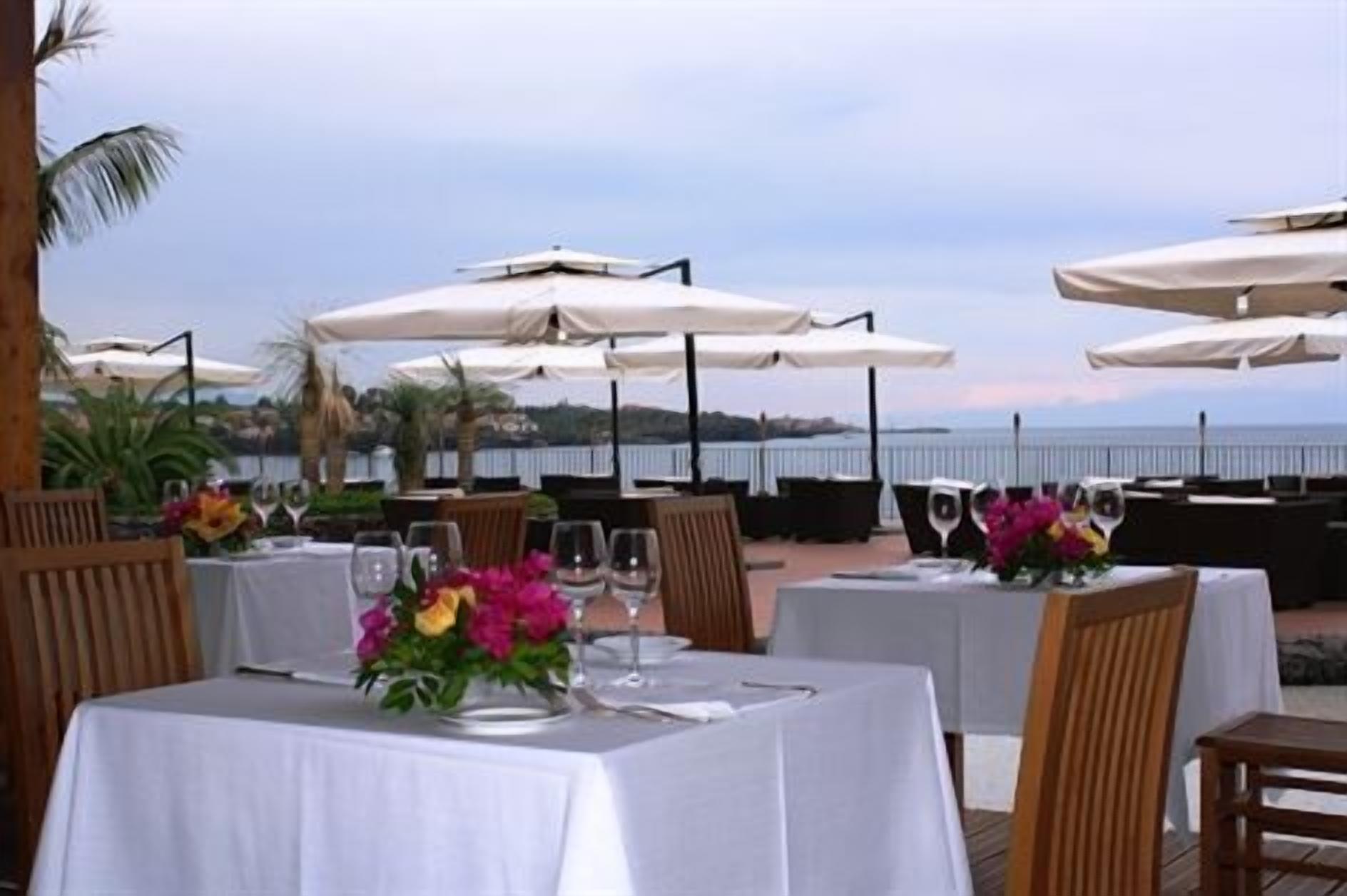 4 restaurants, lunch, dinner served; local cuisine