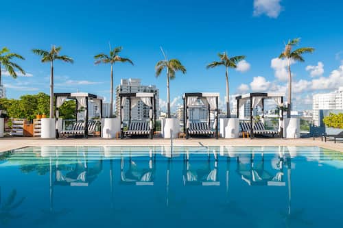 Outdoor pool, open 7:30 AM to 8 PM, pool cabanas (surcharge)