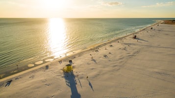 Beach nearby, white sand, sun loungers, beach umbrellas